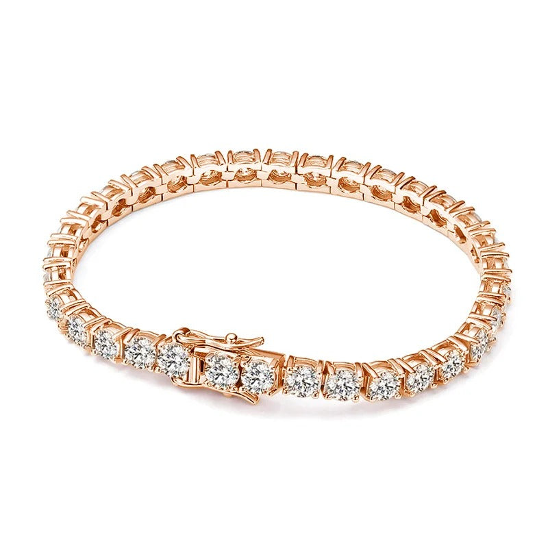 Rose gold bracelet with diamonds on a white background