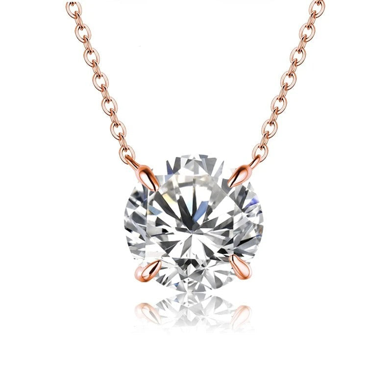 Rose gold necklace with a large diamond pendant on a white background, featuring 'Charming Light' branding.